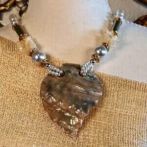 Vintage statement necklace featuring a leaf shaped abalone shell